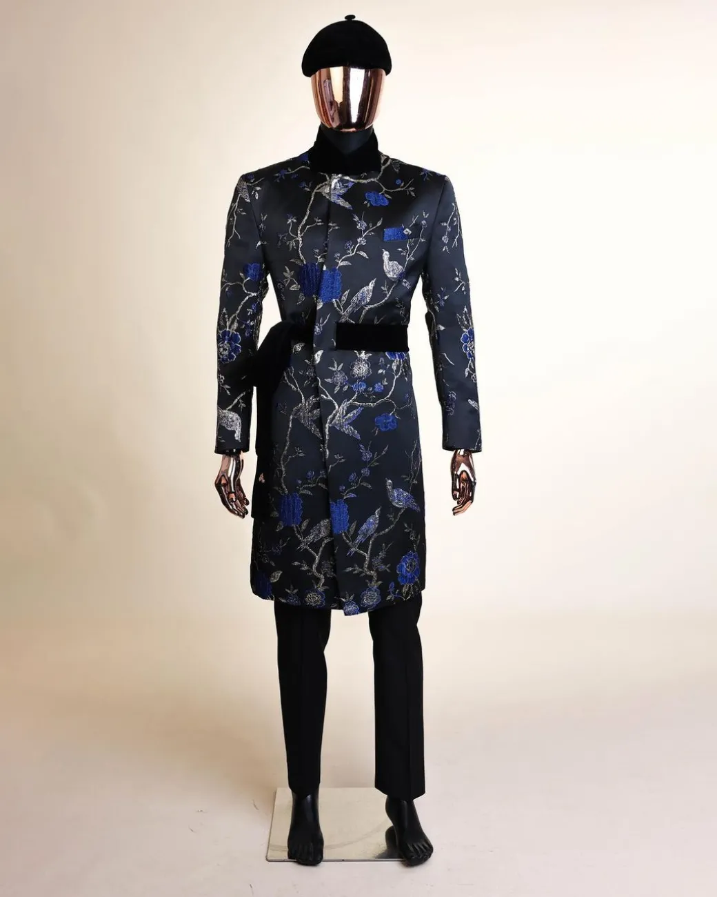 A Gold, black and blue double breasted safari suit, raven and forest metallic pattern jacquard