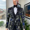 A Gold, black, and blue peak lapel, raven, and forest metallic pattern jacquard Suit