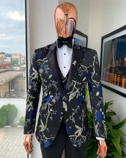 A Gold, black, and blue peak lapel, raven, and forest metallic pattern jacquard Suit