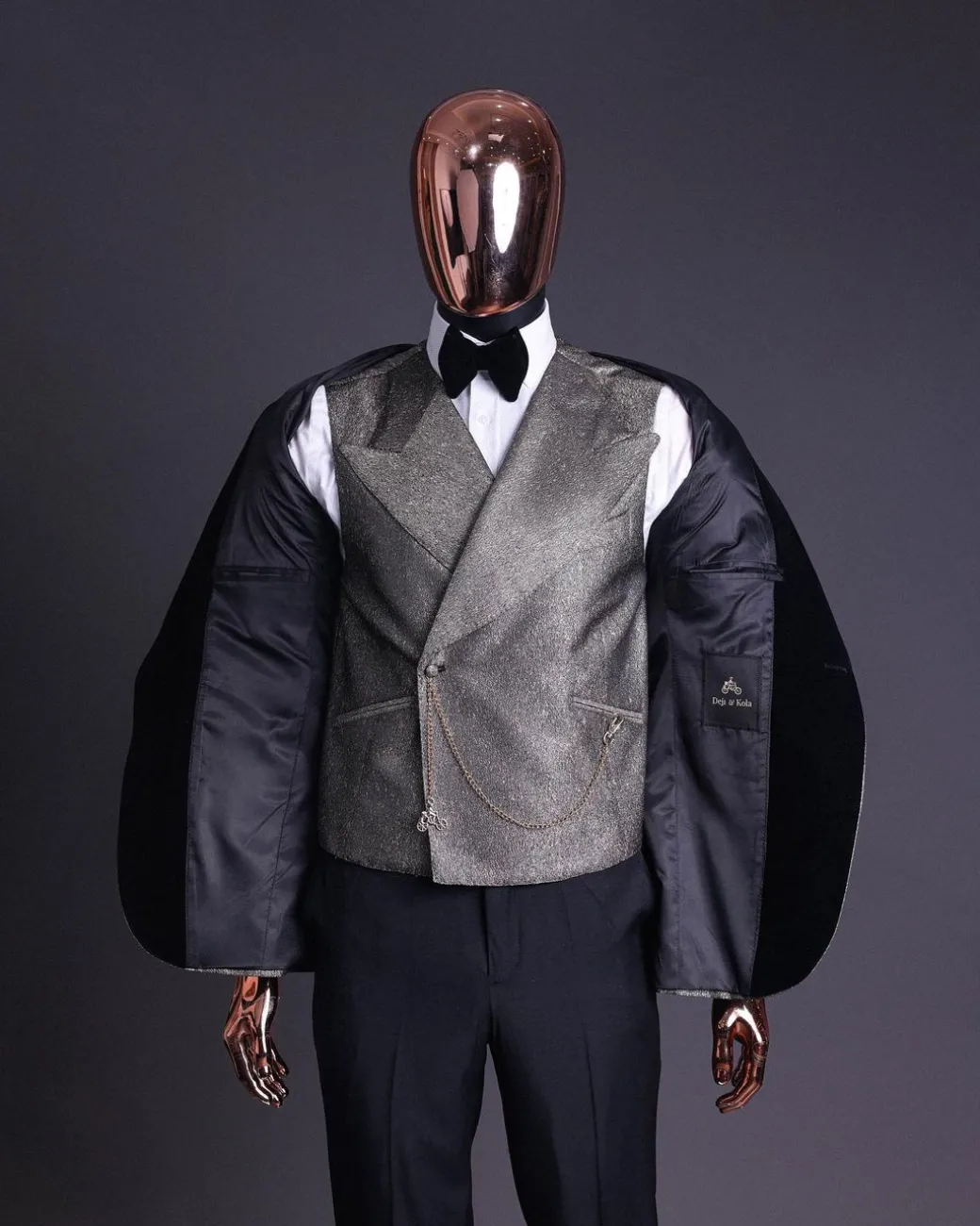 A Gold, black and silver mix metallic jacquard, peak lapel tuxedo suit