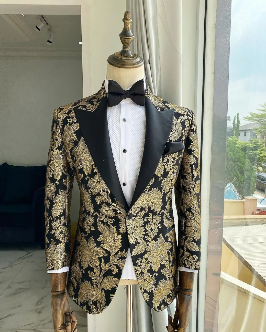 A Gold Patterned Jacquard Peak Label tuxedo suit