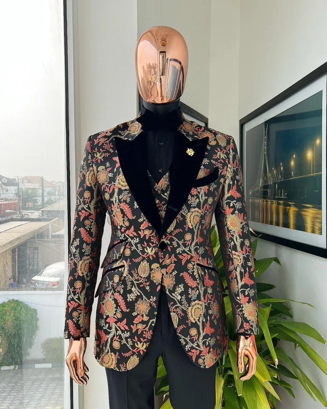 A Gold, peach and black mix metallic jacquard, peak lapel tuxedo suit