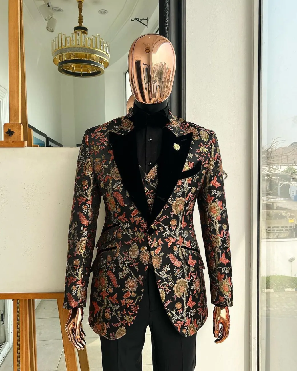 A Gold, peach and black mix metallic jacquard, peak lapel tuxedo suit