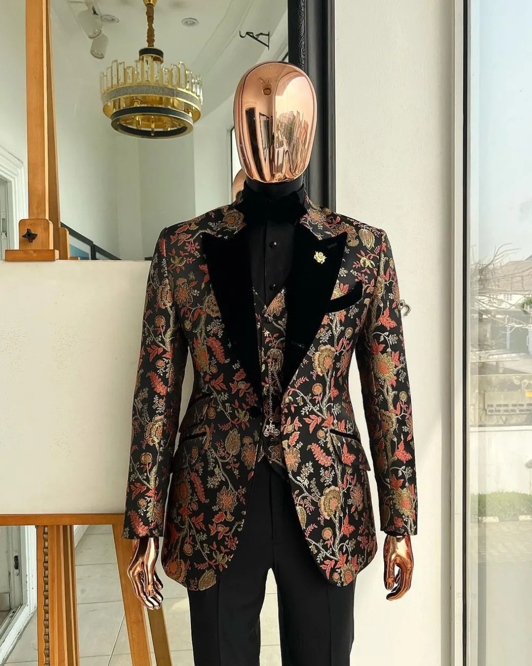 A Gold, peach and black mix metallic jacquard, peak lapel tuxedo suit