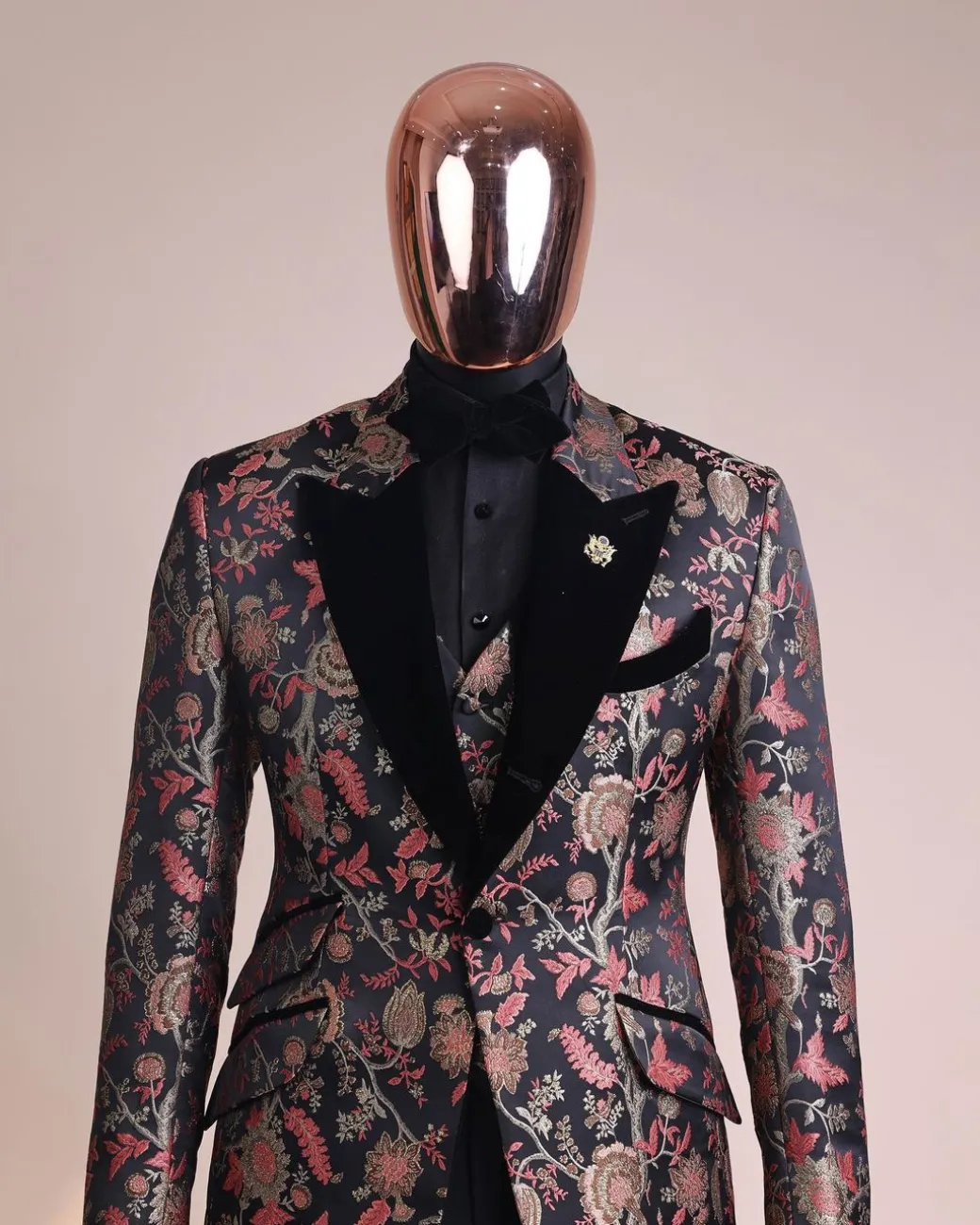 A Gold, peach and black mix metallic jacquard, peak lapel tuxedo suit