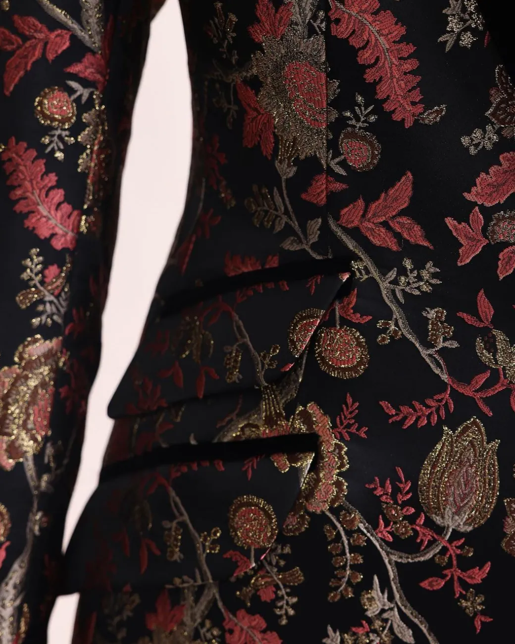 A Gold, peach and black mix metallic jacquard, peak lapel tuxedo suit