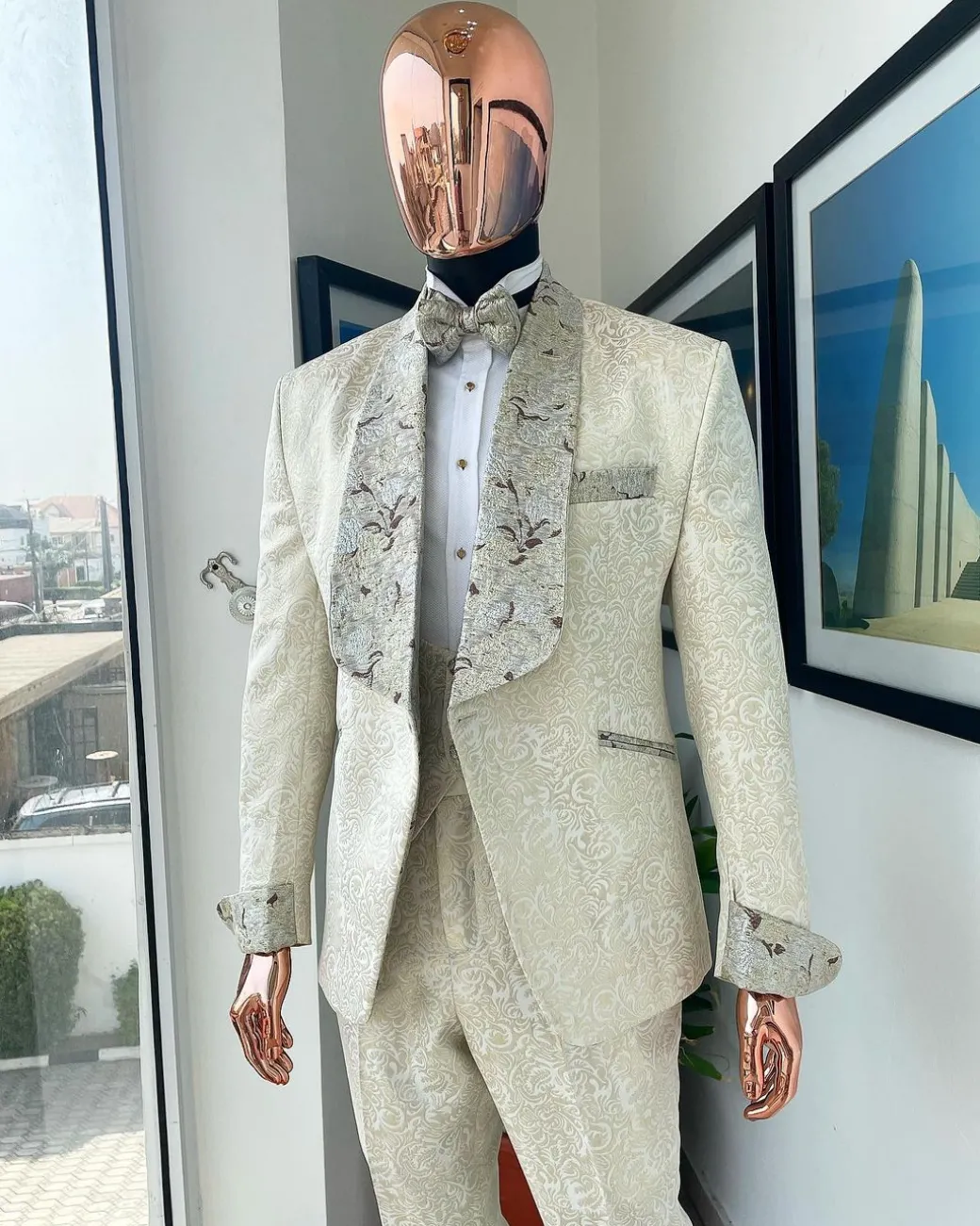 A gold print pattern tuxedo suit, contemplation cream with maroon, champagne gold floral metallic jacquard shawl lapel
