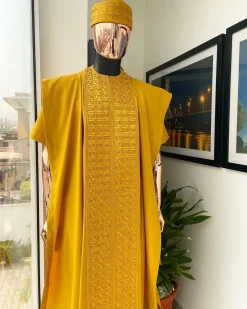 A Gold Yellow, Connected Square Embroidery Design with Matching Gold Swarovski Stone Details Agbada