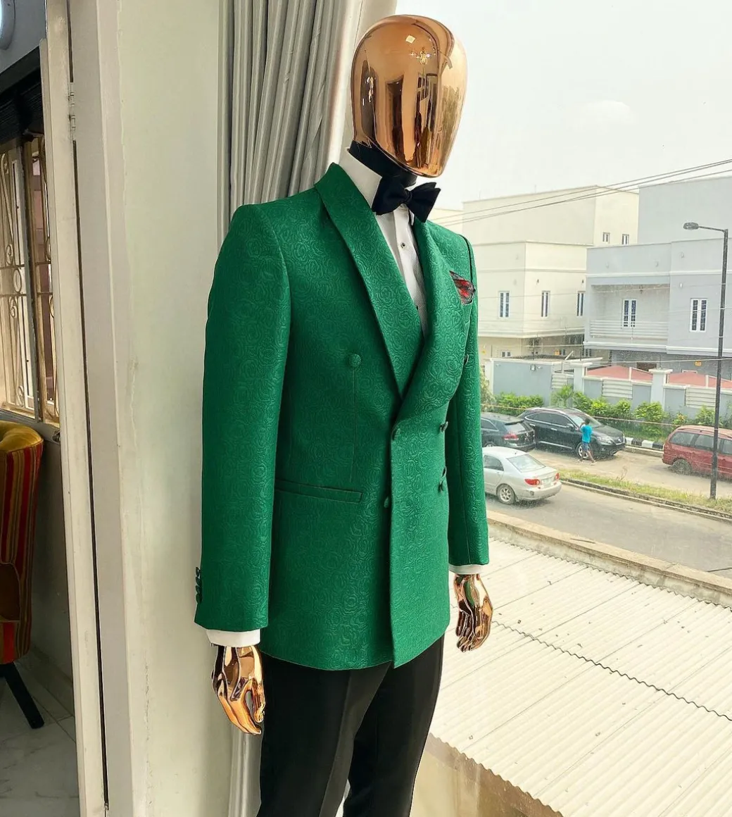 A Grass green double breasted shawl lapel floral pattern jacquard tuxedo suit
