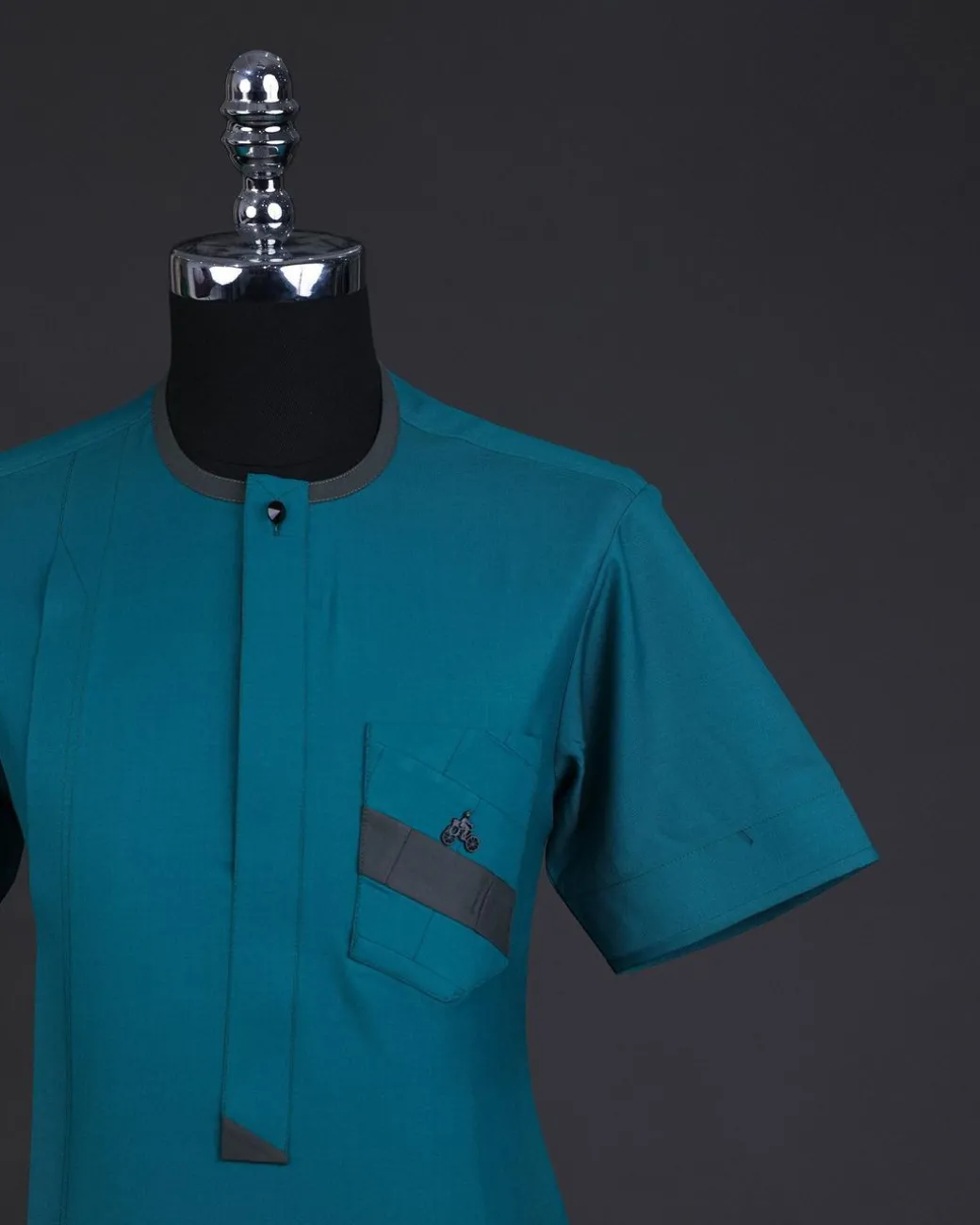 A Green, front flap, & layered rectangle pocket details, short sleeve African senator kaftan native.