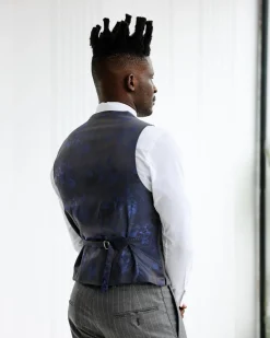 A Grey and ivory white pencil stripe, double-breasted shawl lapel waistcoat.