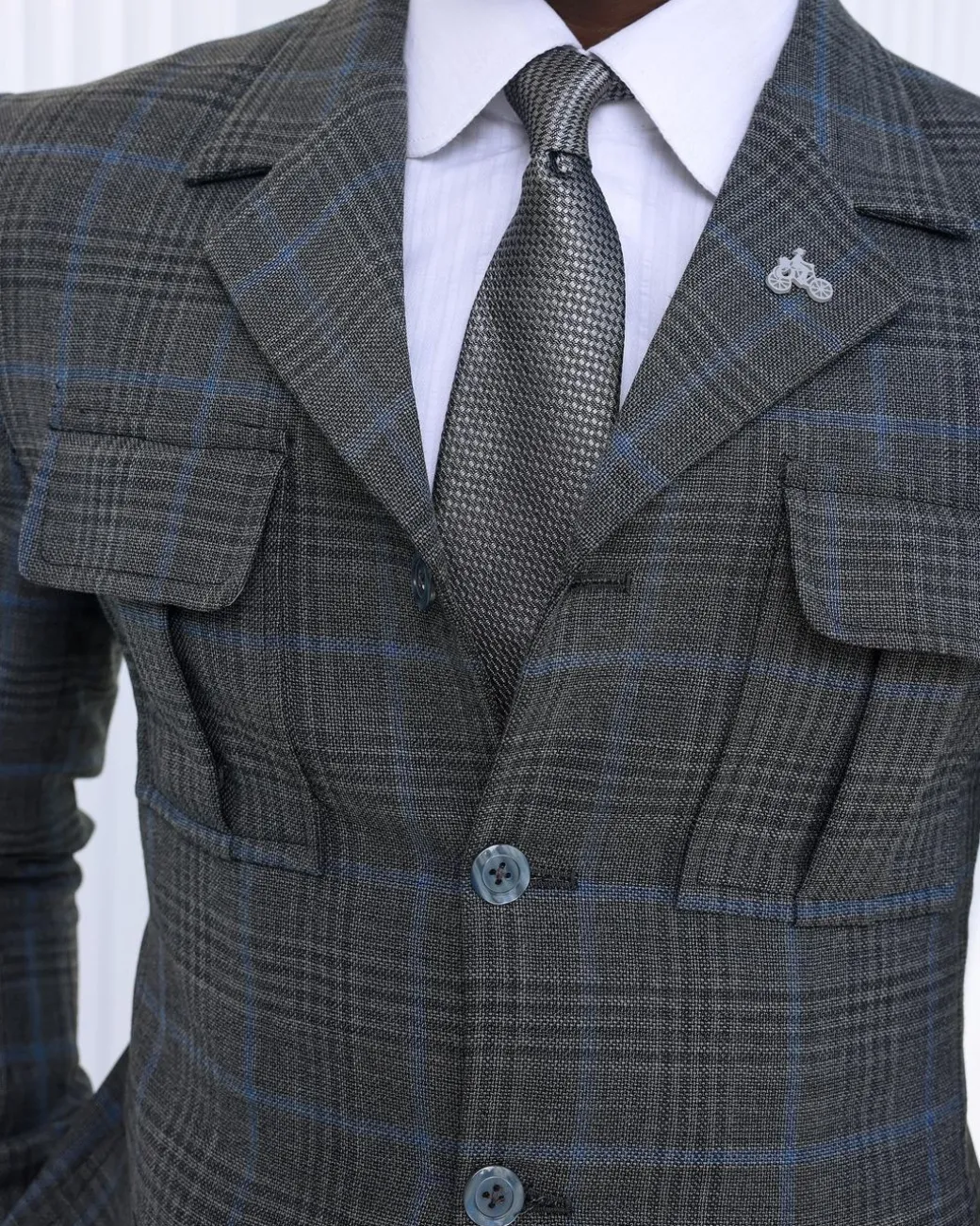 A Grey and light blue tattersall check overcoat
