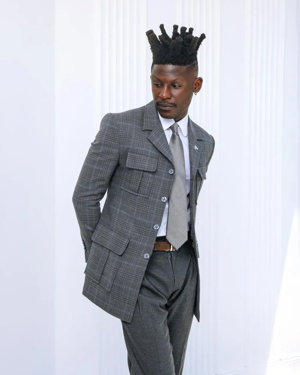 A Grey and light blue tattersall check overcoat