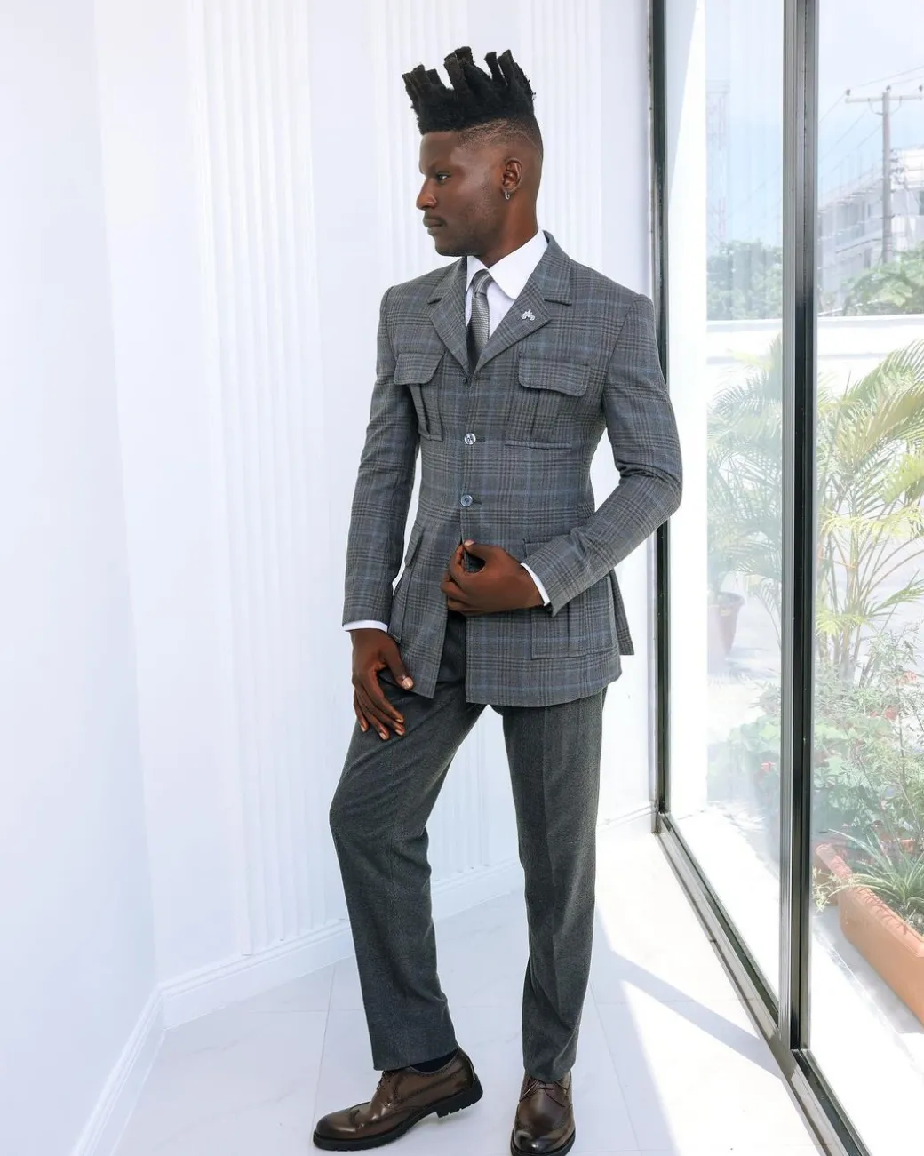 A Grey and light blue tattersall check overcoat