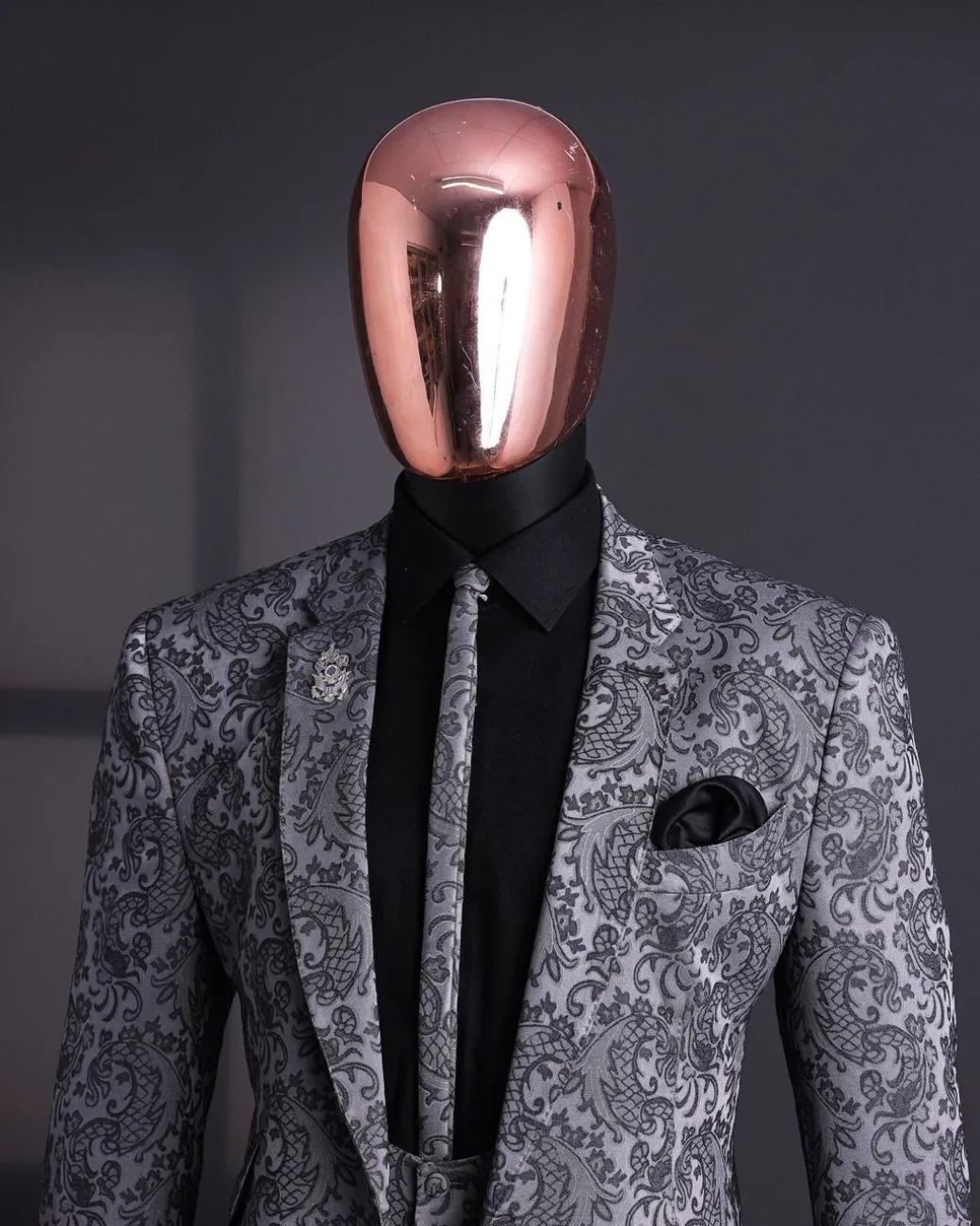 A Grey dragon floral, knitted, notch lapel suit.