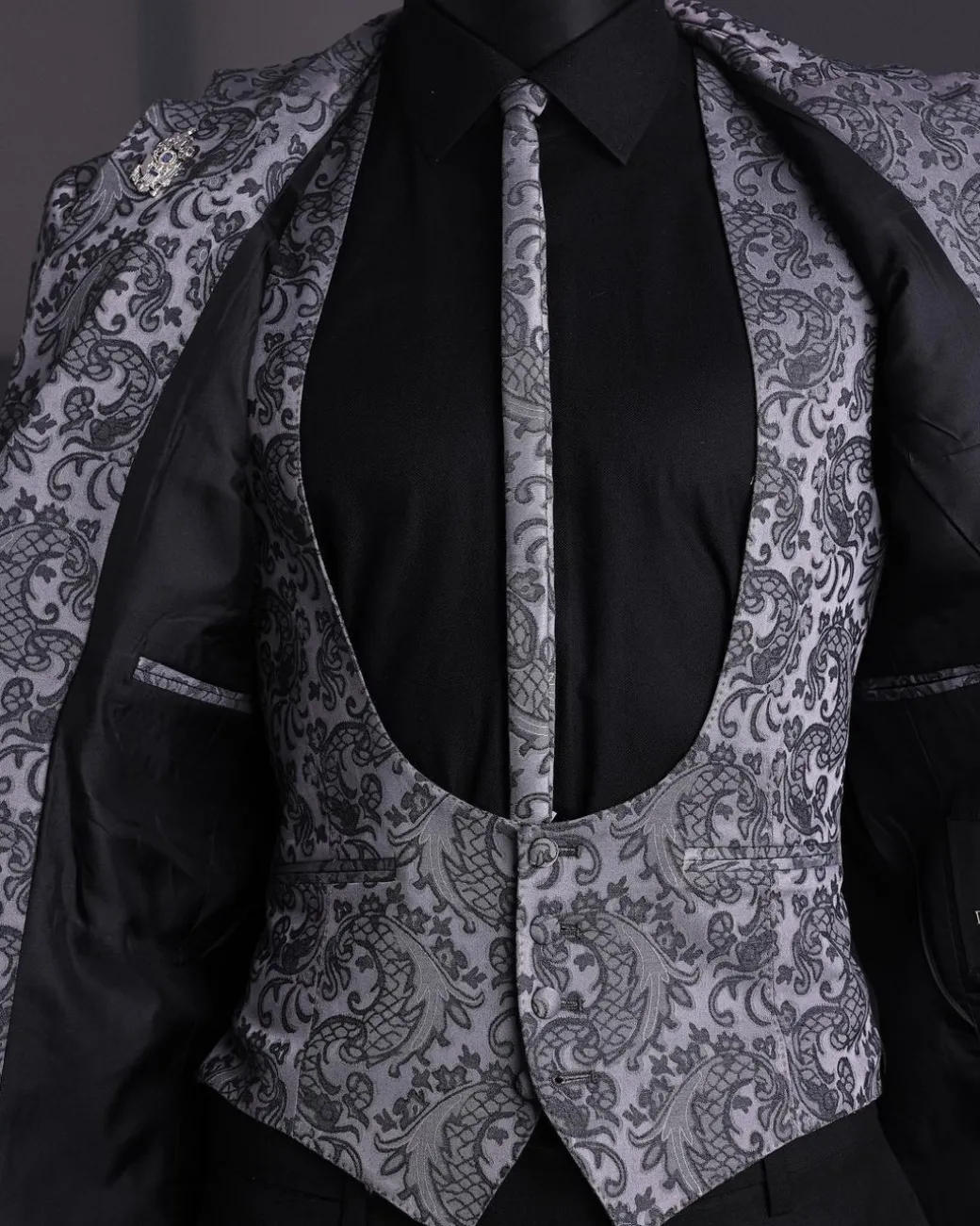 A Grey dragon floral, knitted, notch lapel suit.