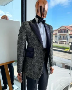 A grey floral jacquard, peak lapel with black silk taping tuxedo suit