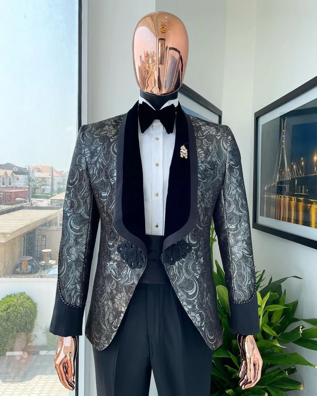 A grey, Iron and shadow grey metallic jacquard royal shawl lapel tuxedo suit
