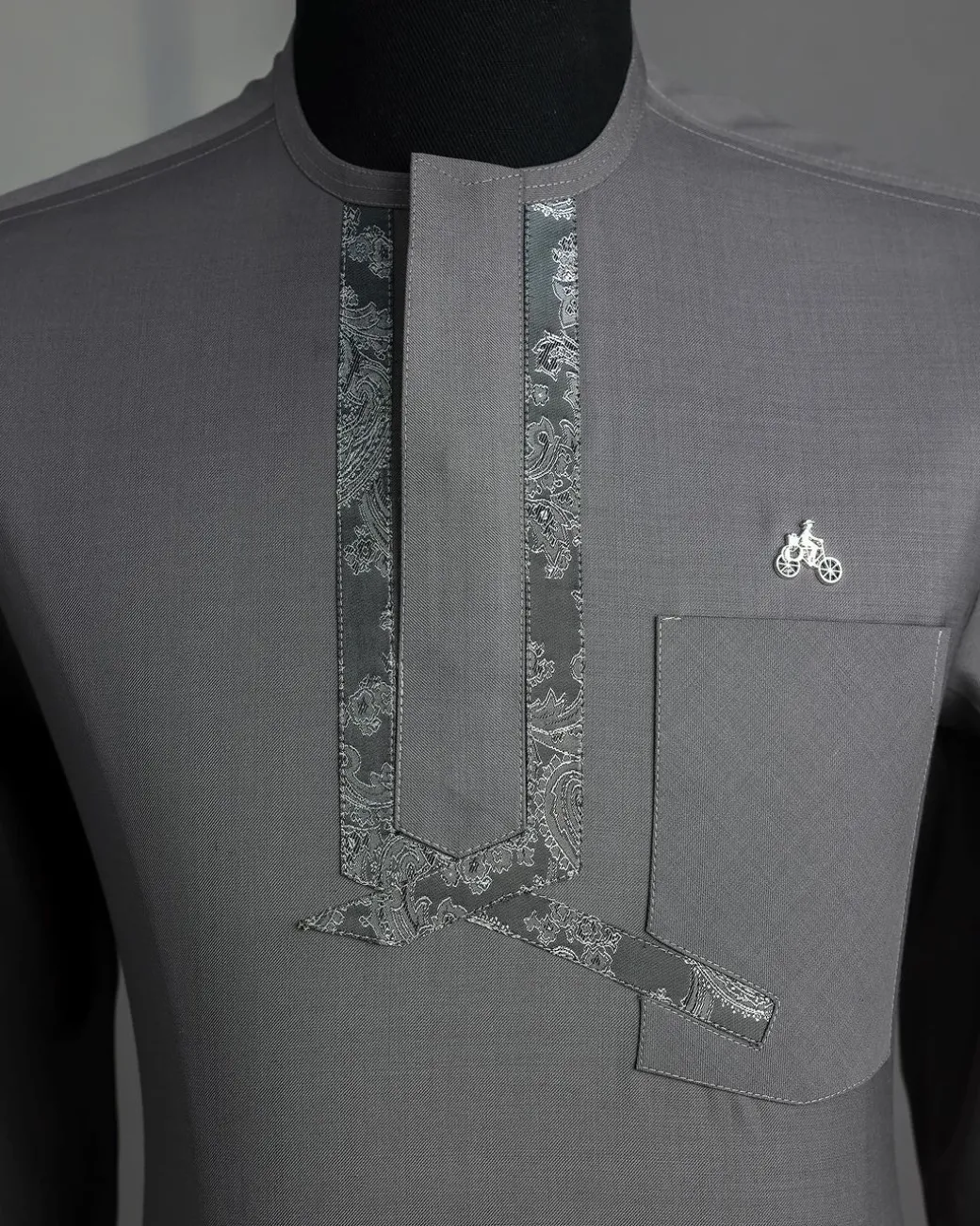 A Grey, matching slanted paisley, front flap, 3/4-sleeve African senator kaftan native.