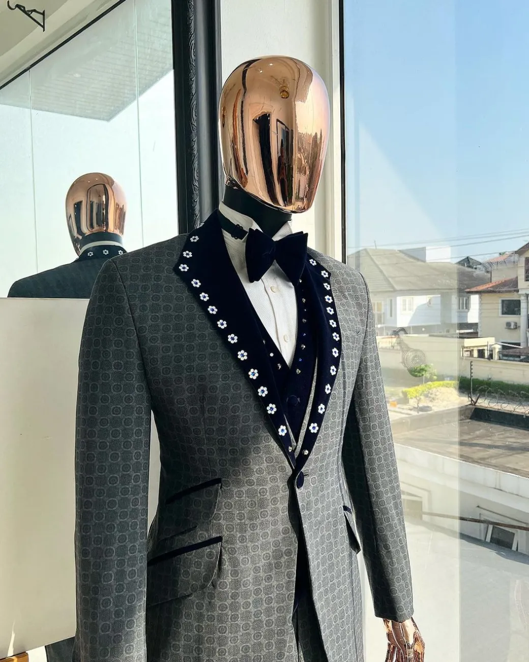 A Grey Octagonal Patterned, Navy blue mix, notch lapel with mixed Swarovski button details