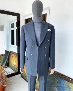 A Grey Pinstripe Peak Lapel Double Breasted Suit