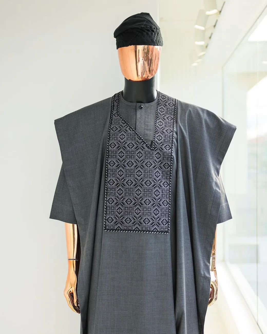 A Grey, Splashed Square Details Agbada