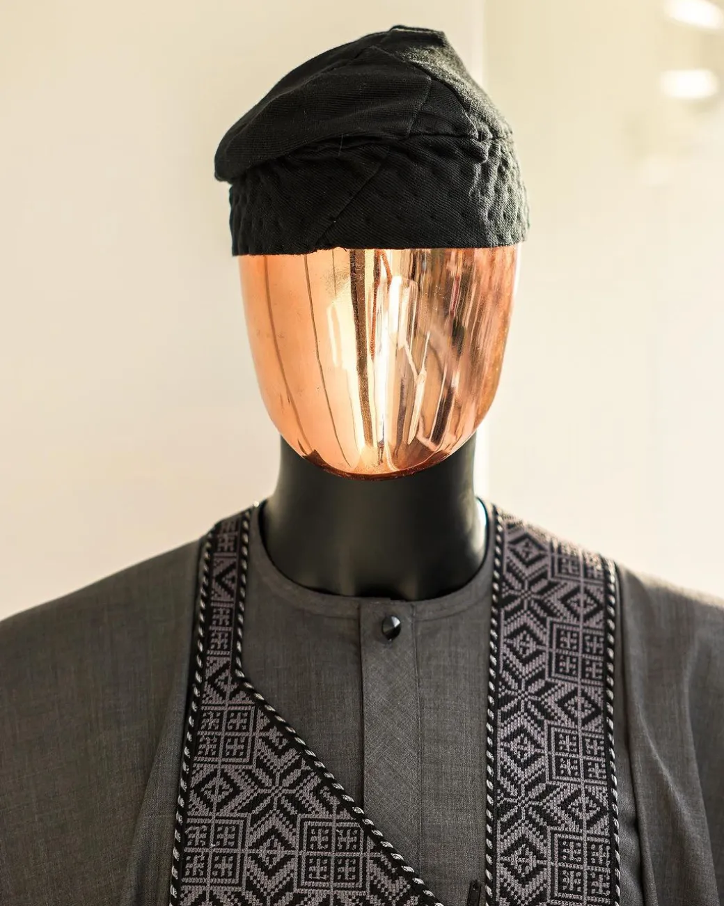 A Grey, Splashed Square Details Agbada