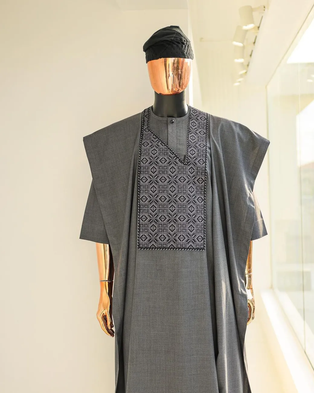 A Grey, Splashed Square Details Agbada