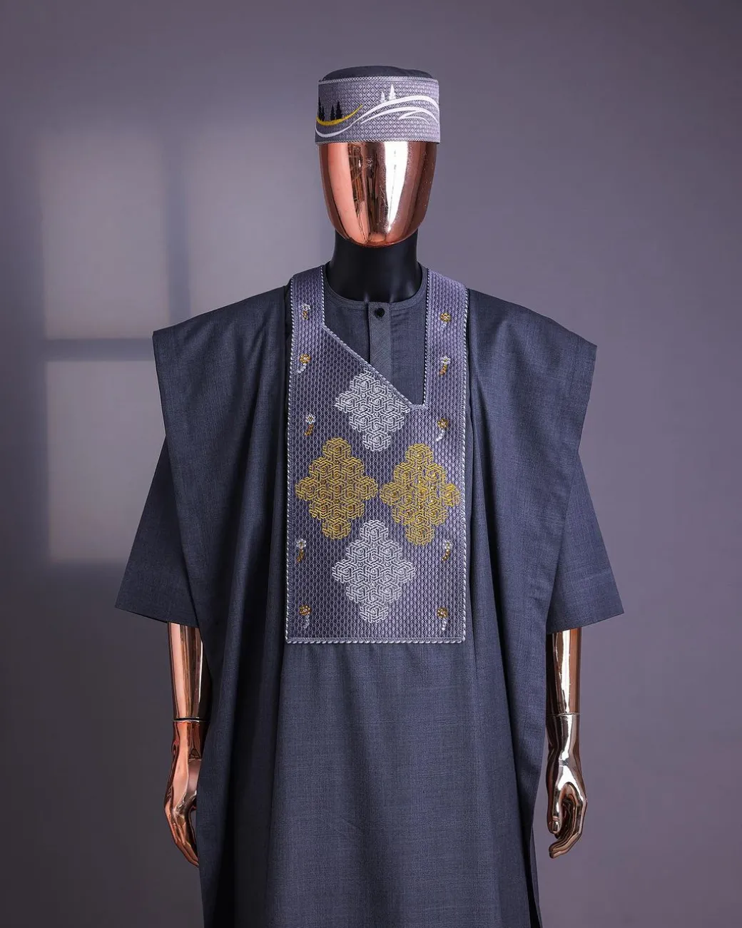 A Grey, Wooven Interconnected Square Details Agbada