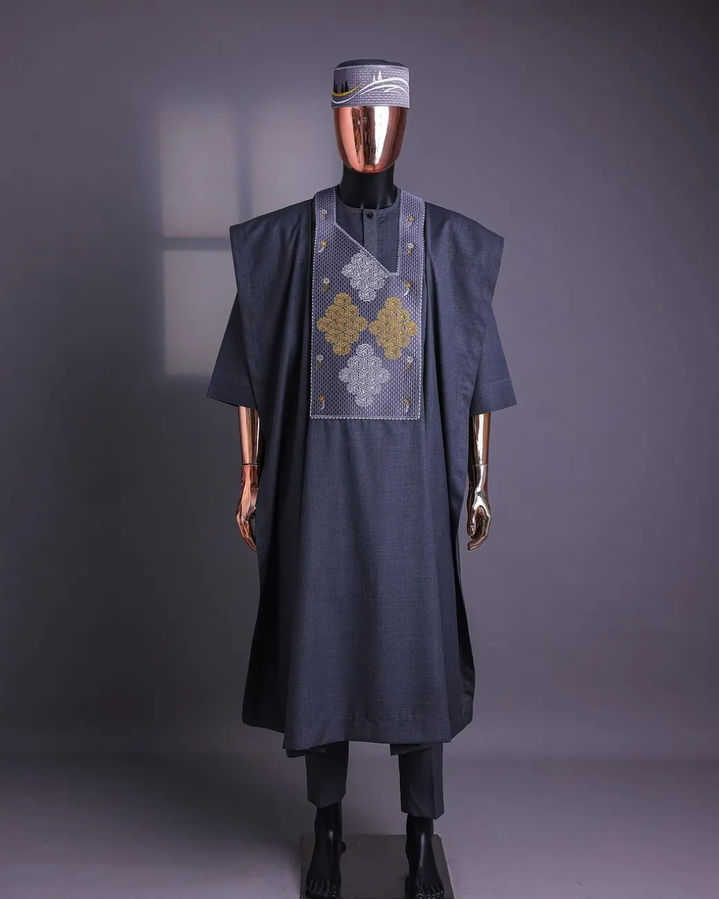 A Grey, Wooven Interconnected Square Details Agbada
