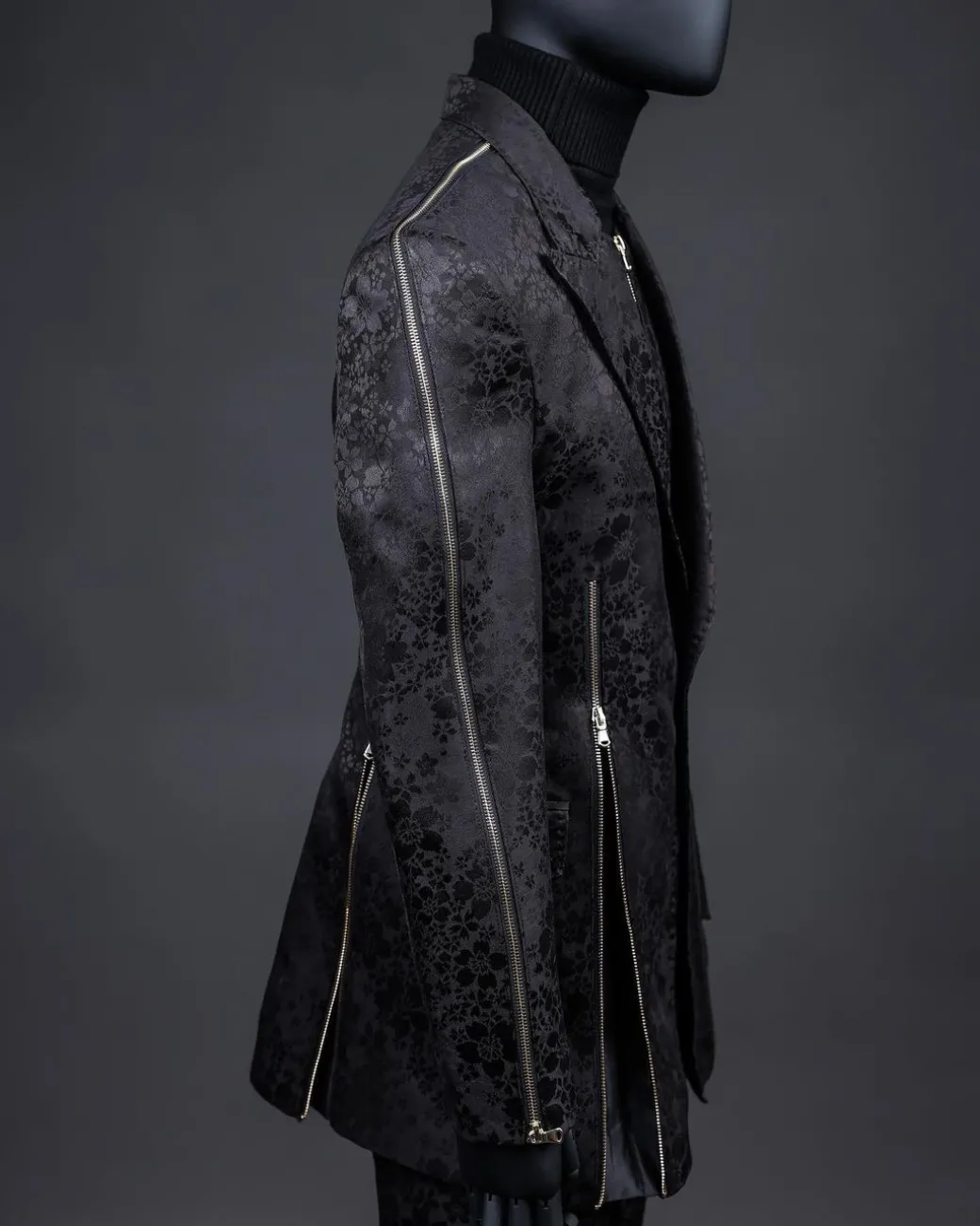 A hand knitted, “Ziplock” charcoal black dotted and dispersed floral paisley Jacquard blazer suit