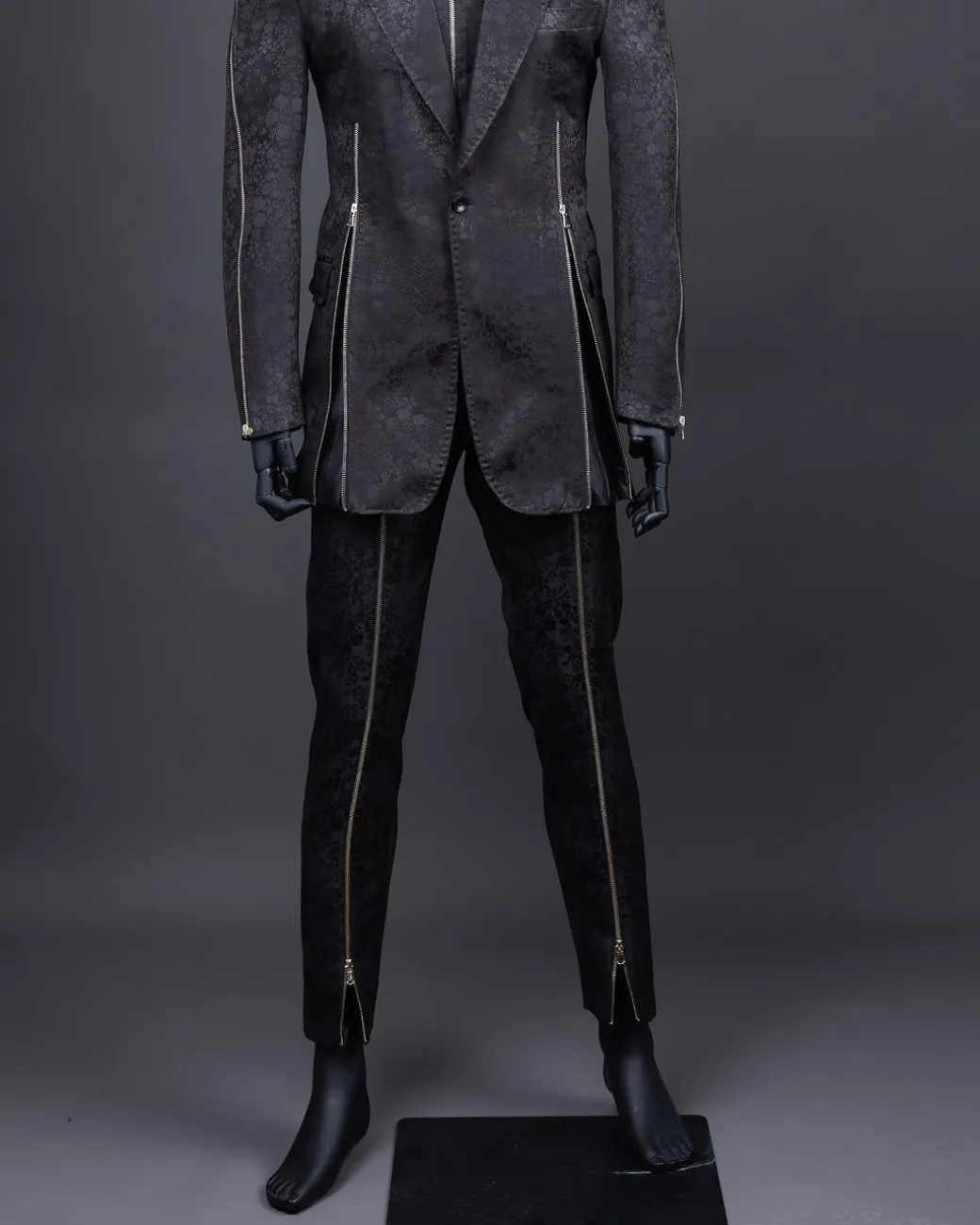 A hand knitted, “Ziplock” charcoal black dotted and dispersed floral paisley Jacquard blazer suit