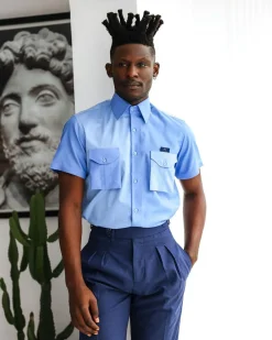 A Herringbone mix shade of blue English spread collar short sleeve casual shirt with double patch pocket.