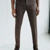 A Hickory brown & black check, nobility, tapered cut pant with side metal adjuster.