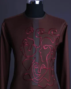 A Hickory Brown, front flap with “Eve Of May” embroidery detailing African senator kaftan native.