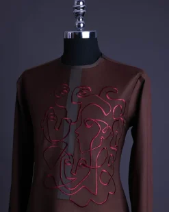 A Hickory Brown, front flap with “Eve Of May” embroidery detailing African senator kaftan native.