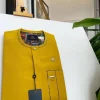 A honey yellow, clear view glass Swarovski buttons detailing African traditional senator kaftan native.