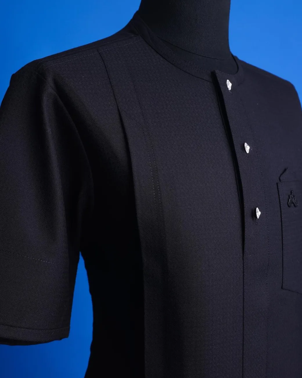 A Jorgecarli, charcoal black, invisible square patterns, front flap with silver Swarovski button African senator kaftan.