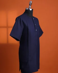 A Jorgecarli wool, midnight blue, invisible windowpane check, front flap with silver Swarovski button, shorts sleeve African senator kaftan native.