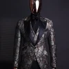 A knitted, brown, silver and black floral jacquard peak lapel suit