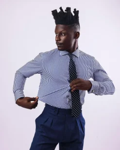 A knitted elastic, white and blue stripe shirt.