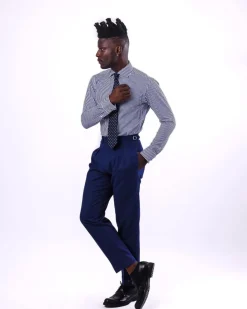 A knitted elastic, white and blue stripe shirt.