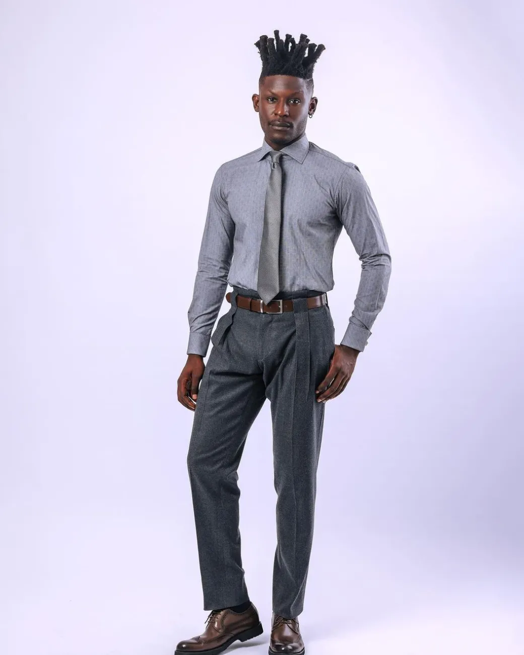 A knitted, Grey, notch lapel, patch pocket business suit