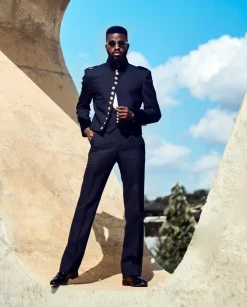 A Layered Combat Charcoal Black Tuxedo Suit.