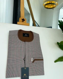 A Light and dark brown check, front flap and sliding pocket details African traditional kaftan native.