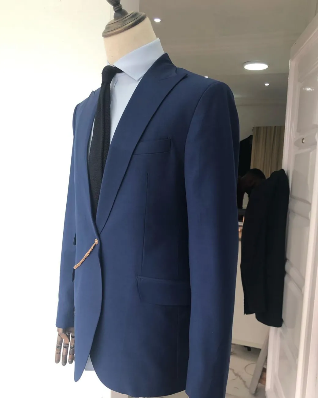 A Light Blue, Peak Lapel, One Button Tailored Suit with Gold Detailing
