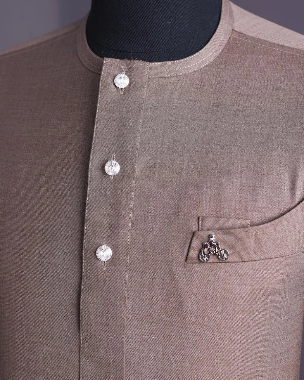 A Light brown, jorgecarli fabric, front flap with silver Swarovski button, long sleeve African senator kaftan native.
