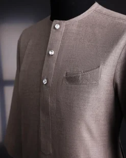 A Light cedar brown, Jorgecarli wool, front flap, layered suit & pen pocket, 3/4 sleeve and clear view silver Swarovski button African senator kaftan native.