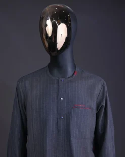 A Light grey and blue stripe Jorgecarli fabric with blue Swarovski button long-sleeve kaftan and Sokoto