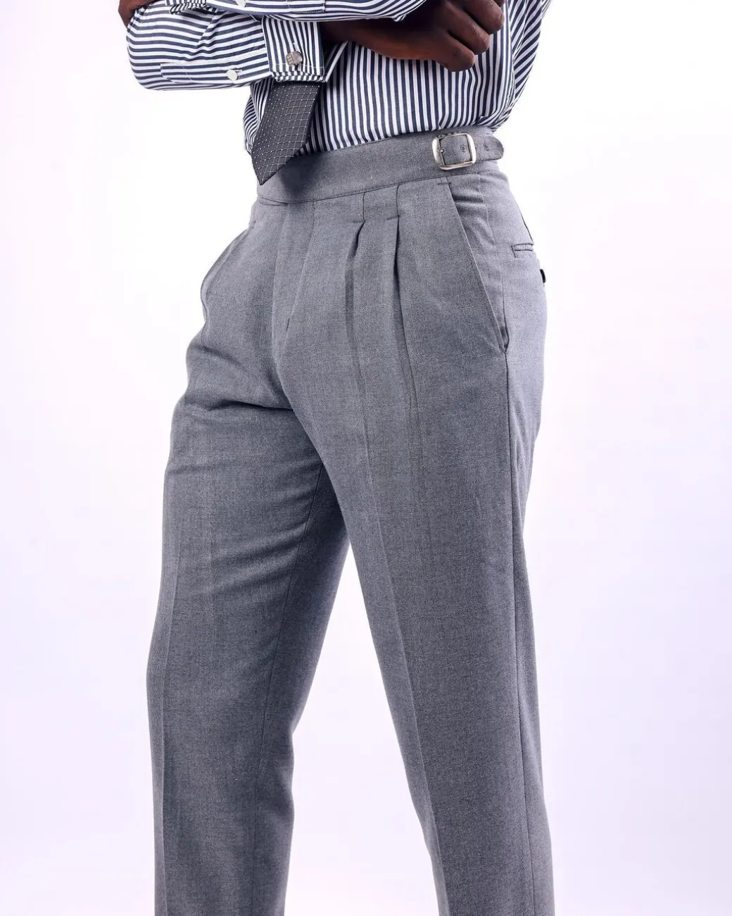 A Light grey, double pleat with side metal adjuster Gurkha pant